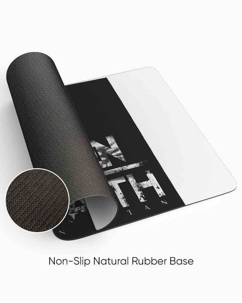 Survey Corps – Strengthen Your Faith Gaming Desk Mat rolled to show the natural rubber base