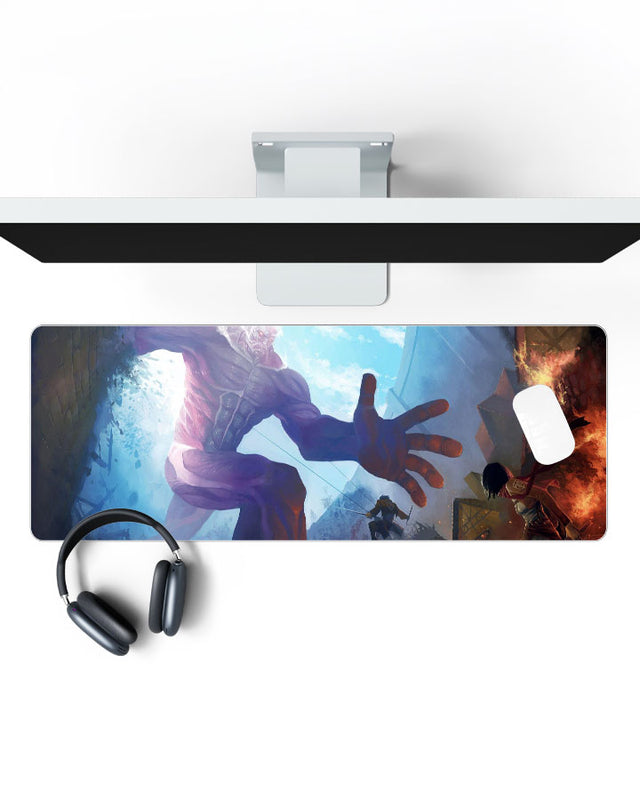 Colossal Titan vs Mikasa Ackerman Gaming Desk Mat on a desk, top view