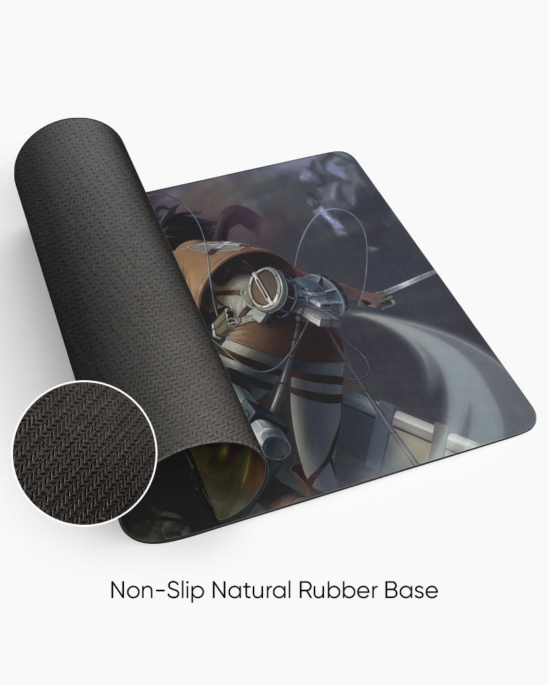 Colossal Titan – Scout Attack Gaming Desk Mat rolled to show the natural rubber base