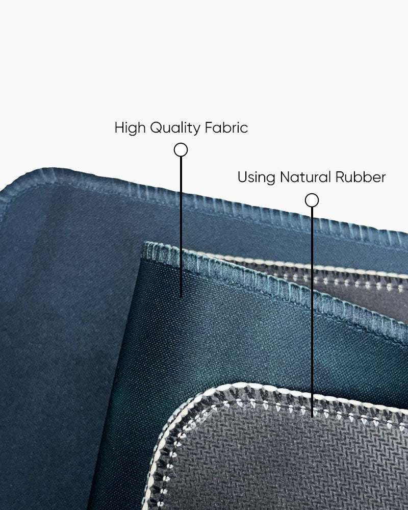 Desk mat layers: high quality fabric top on a natural rubber base