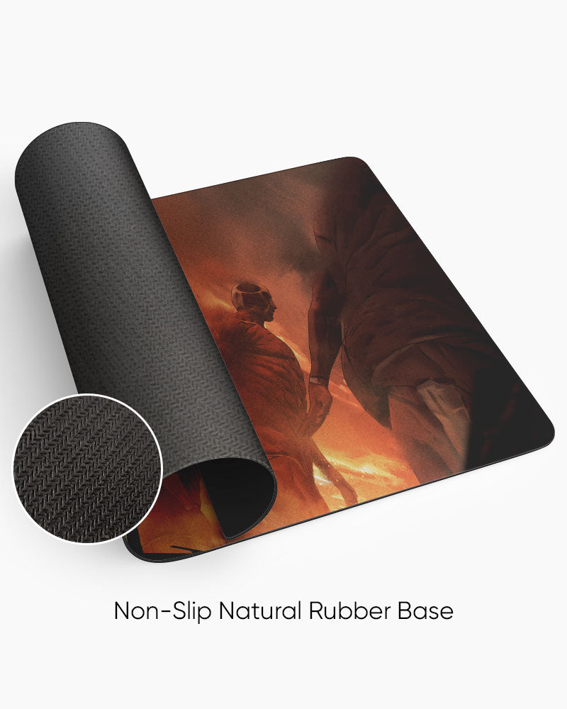 The Rumbling Gaming Desk Mat rolled to show the natural rubber base