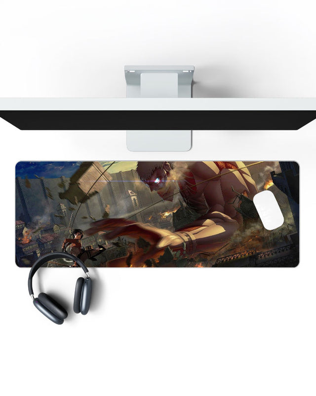 Armored Titan vs Mikasa Ackerman Gaming Desk Mat on a desk, top view