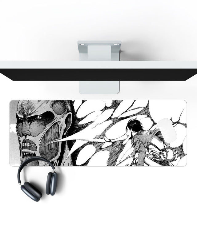 Eren Yeager vs Colossal Titan – Manga Gaming Desk Mat on a desk, top view