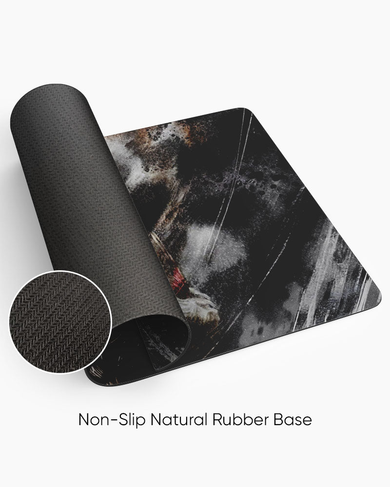 Armored Titan – Reiner Braun Gaming Desk Mat rolled to show the natural rubber base
