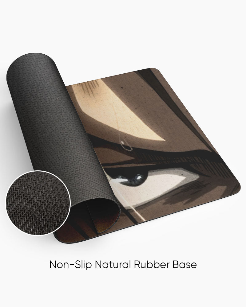 Eren Yeager – Close-Up Gaming Desk Mat rolled to show the natural rubber base